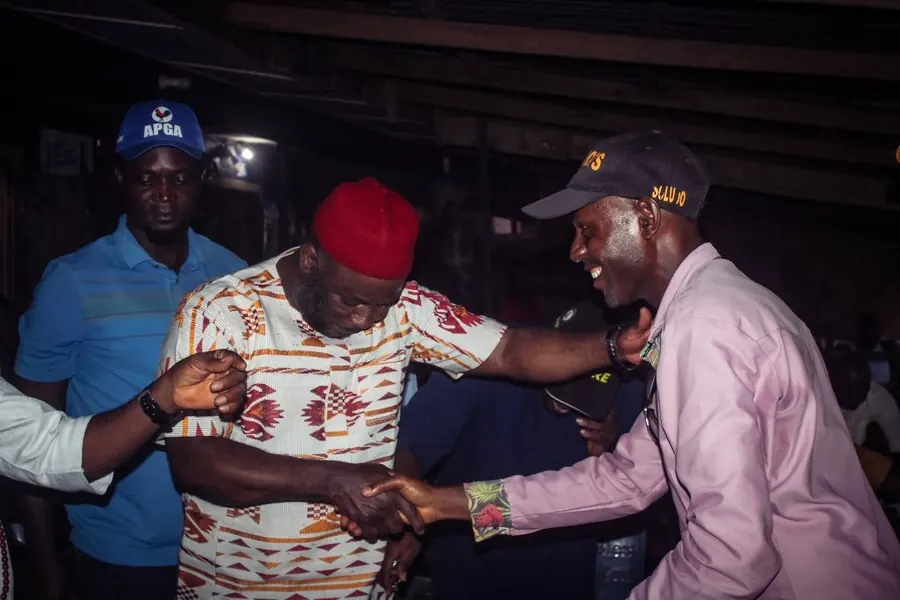 Dr. Nwankwor being welcomed by community members